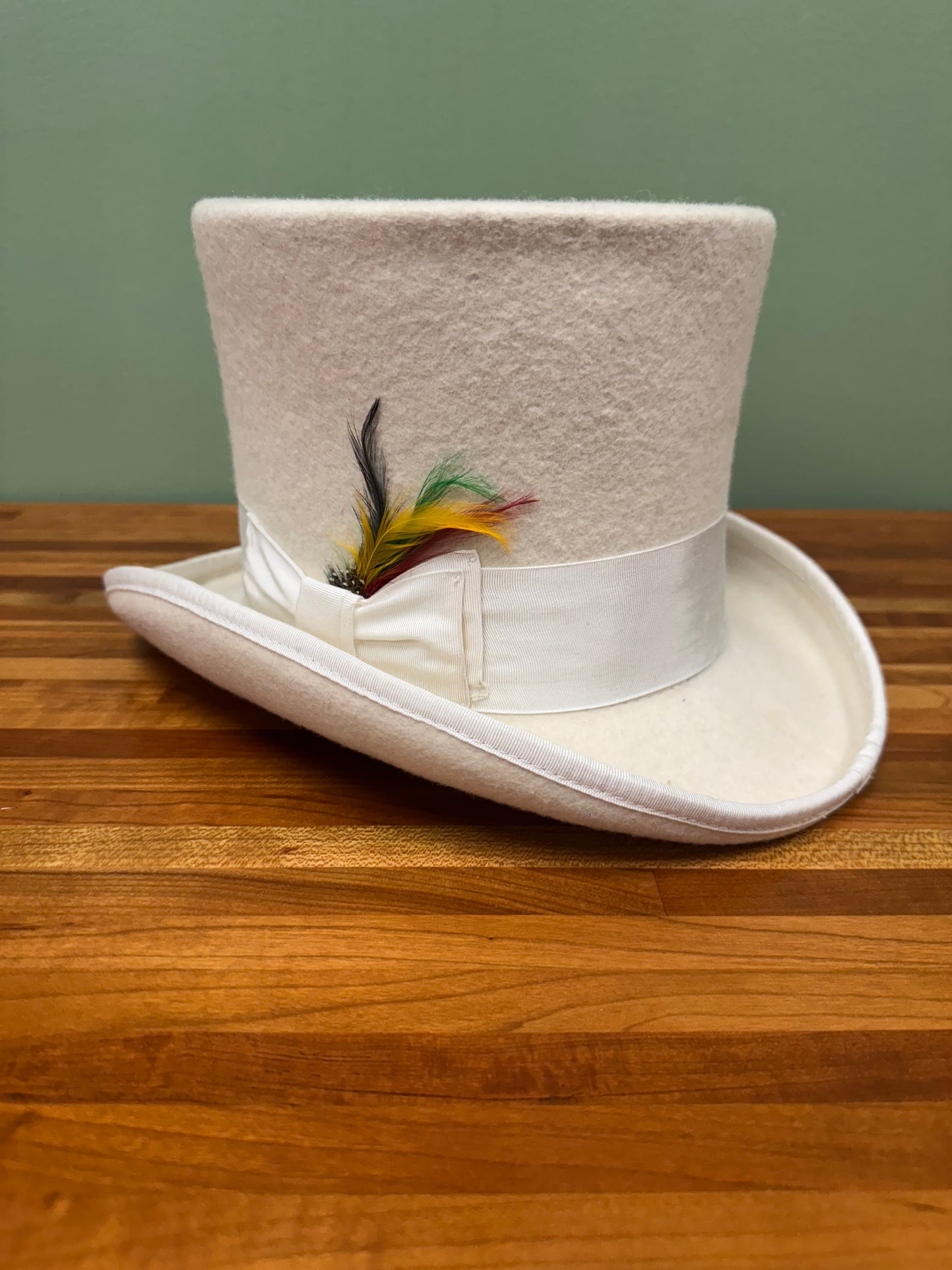 White Felt Top Hat With White Ribbon and Feathers