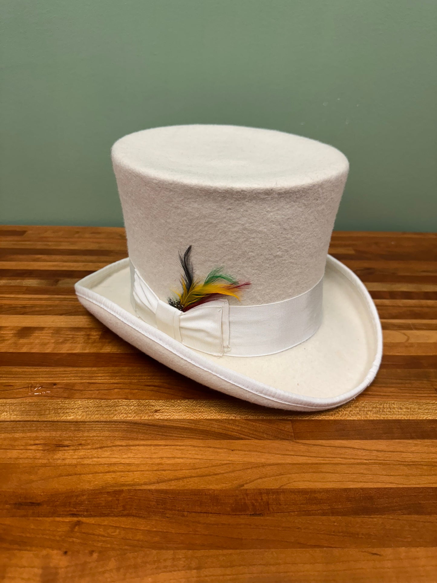 White Felt Top Hat With White Ribbon and Feathers